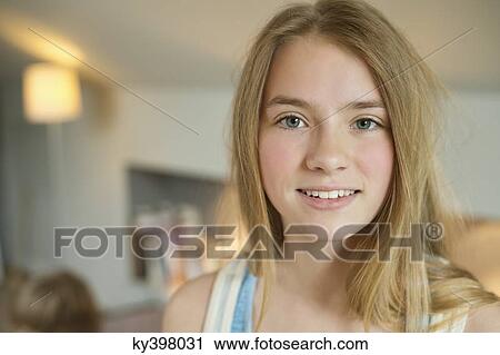 Portrait of a girl smiling View Large Photo Image Stock Image - Portrait of a girl smiling. Fotosearch