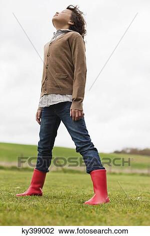 Boy daydreaming in a field View Large Photo Image Stock Image - Boy daydreaming in a field. Fotosearch