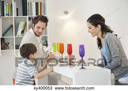Family at mini bar at home View Large Photo Image Stock Image - Family at mini bar at home. Fotosearch