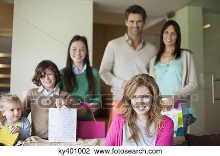 Family at a birthday party View Large Photo Image Stock Image - Family at a birthday party. Fotosearch