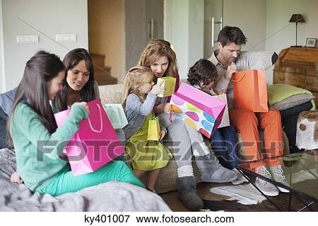 Family at a birthday party View Large Photo Image Stock Photo - Family at a birthday party. Fotosearch