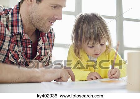 Man teaching his daughter View Large Photo Image Stock Photograph - Man teaching his daughter. Fotosearch