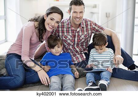 Portrait of a happy family View Large Photo Image Stock Image - Portrait of a happy family. Fotosearch