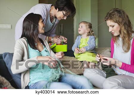 Picture - Women knitting. Fotosearch