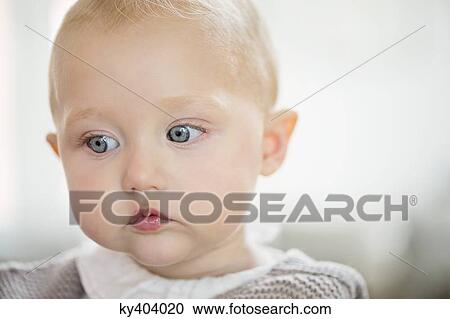 Stock Image - Close-up of a baby girl. Fotosearch