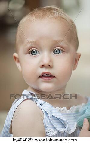 Stock Photo - Close-up of a baby girl. Fotosearch