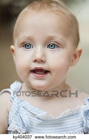 Close-up of a baby girl View Large Photo Image Stock Photo - Close-up of a baby girl. Fotosearch