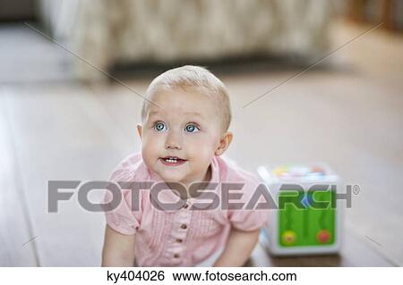 Stock Photograph - Close-up of a baby girl. Fotosearch