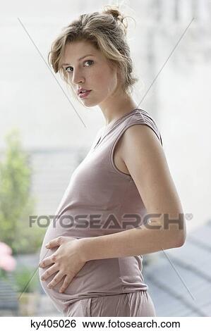 Portrait of a pregnant woman View Large Photo Image Stock Photograph - Portrait of a pregnant woman. Fotosearch