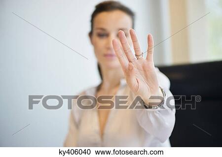 Businesswoman showing her wedding ring View Large Photo Image Stock Image - Businesswoman showing her wedding ring. Fotosearch