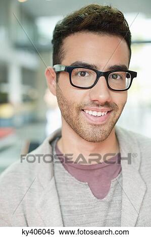 Portrait of a businessman smiling View Large Photo Image Stock Photography - Portrait of a businessman smiling. Fotosearch