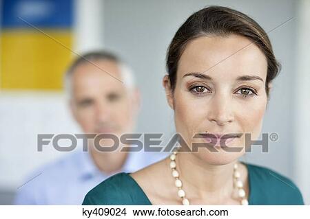 Picture - Portrait of a businesswoman in an office. Fotosearch