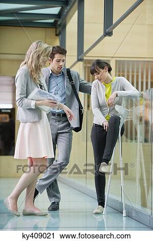 Stock Image - Woman leaning against, Europe. Fotosearch