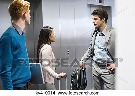 Business people discussing View Large Photo Image Picture - Business people discussing. Fotosearch