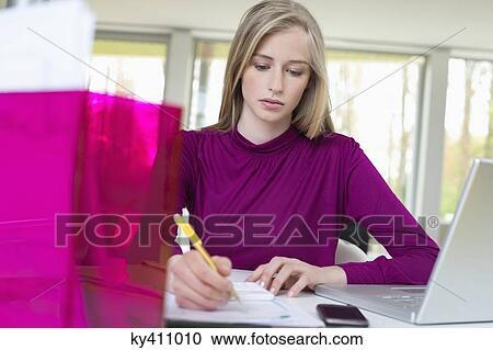 Businesswoman working in the home office View Large Photo Image Stock Image - Businesswoman working in the home office. Fotosearch