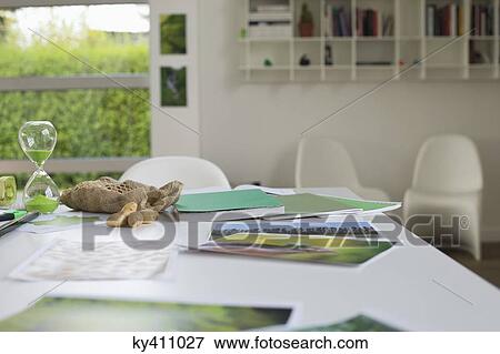 Ecology sustainable development related photographs on a table View Large Photo Image Stock Photo - Ecology sustainable development related photographs on a table. Fotosearch