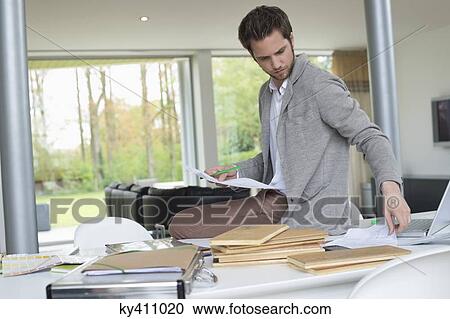 Interior designer working in the office View Large Photo Image Stock Image - Interior designer working in the office. Fotosearch