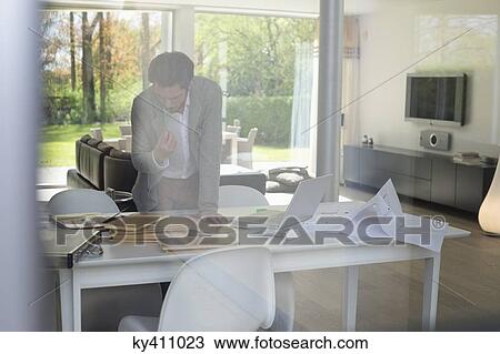 Interior designer working in the office View Large Photo Image Stock Image - Interior designer working in the office. Fotosearch