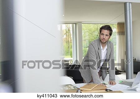 Interior designer working in the office View Large Photo Image Stock Image - Interior designer working in the office. Fotosearch