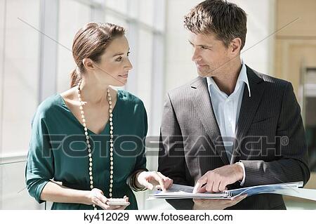 Business executives working in an office View Large Photo Image Stock Photo - Business executives working in an office. Fotosearch