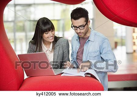 Business executives working in an office View Large Photo Image Stock Photography - Business executives working in an office. Fotosearch