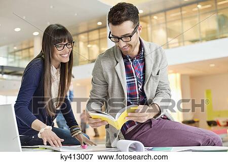 Designers working in an office View Large Photo Image Stock Photo - Designers working in an office. Fotosearch