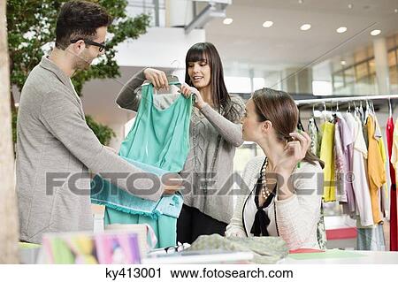 Fashion designers working in an office View Large Photo Image Stock Image - Fashion designers working in an office. Fotosearch