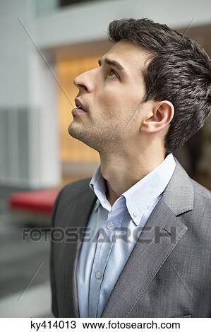 Stock Image - Close-up of a businessman staring. Fotosearch