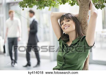 Stock Photo - Close-up of a businesswoman smiling. Fotosearch
