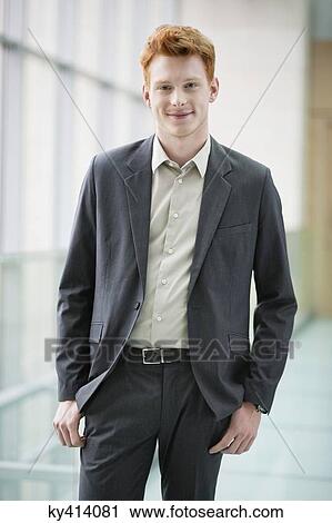 Stock Image - Portrait of a businessman smiling. Fotosearch