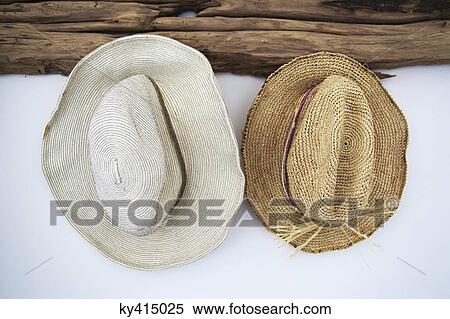 Stock Photography - Close-up of two sunhats. Fotosearch