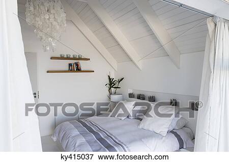 Stock Photo - Interiors of a bedroom. Fotosearch