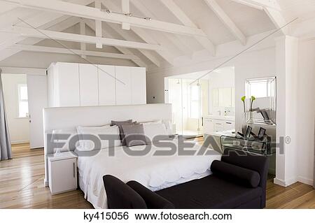 Interiors of a bedroom View Large Photo Image Stock Photograph - Interiors of a bedroom. Fotosearch