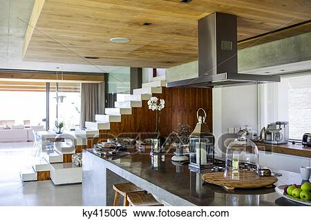 Interiors of a kitchen counter in a studio apartment View Large Photo Image Stock Photography - Interiors of a kitchen counter in a studio apartment. Fotosearch