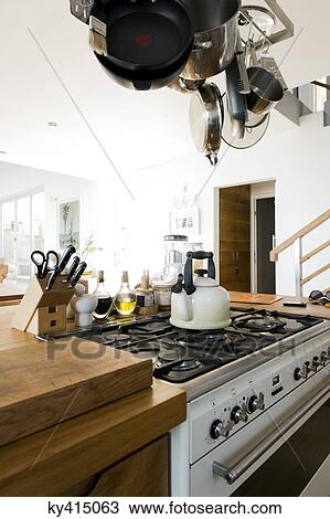 Interiors of a kitchen in a studio apartment View Large Photo Image Stock Image - Interiors of a kitchen in a studio apartment. Fotosearch