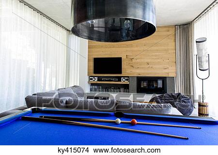 Pool table in a living room View Large Photo Image Picture - Pool table in a living room. Fotosearch