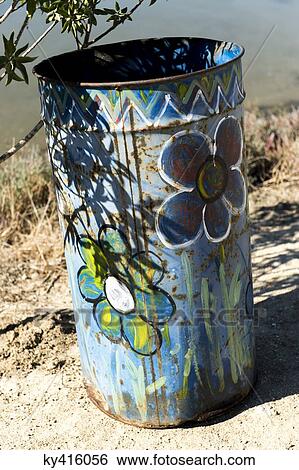 Close-up of a metal dustbin View Large Photo Image Stock Photograph - Close-up of a metal dustbin. Fotosearch