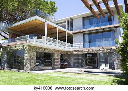 Stock Photo - House viewed from the lawn. Fotosearch