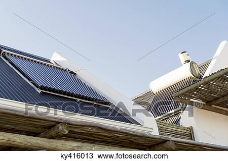 Solar panel on the roof of a house View Large Photo Image Stock Image - Solar panel on the roof of a house. Fotosearch