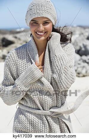 Beautiful woman enjoying on the beach in winter View Large Photo Image Stock Photo - Beautiful woman enjoying on the beach in winter. Fotosearch