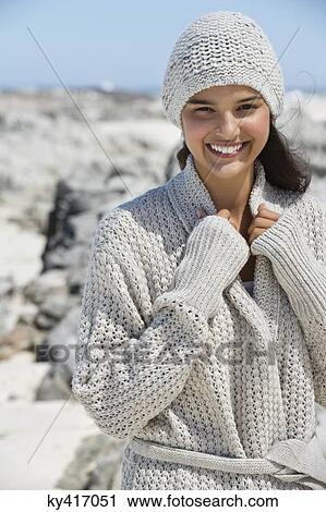 Beautiful woman on the beach in winter View Large Photo Image Stock Image - Beautiful woman on the beach in winter. Fotosearch