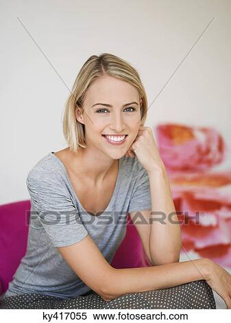 Portrait of a smiling woman posing View Large Photo Image Stock Photography - Portrait of a smiling woman posing. Fotosearch