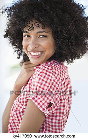 Portrait of a woman smiling View Large Photo Image Stock Image - Portrait of a woman smiling. Fotosearch