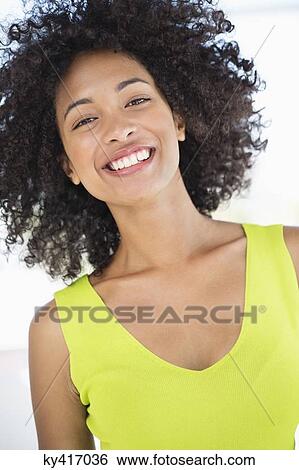 Portrait of a woman smiling View Large Photo Image Stock Photograph - Portrait of a woman smiling. Fotosearch