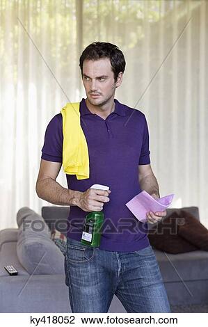 Man holding cleaning equipment View Large Photo Image Stock Image - Man holding cleaning equipment. Fotosearch