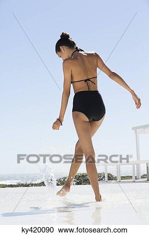 Beautiful woman enjoying on the beach View Large Photo Image Stock Image - Beautiful woman enjoying on the beach. Fotosearch