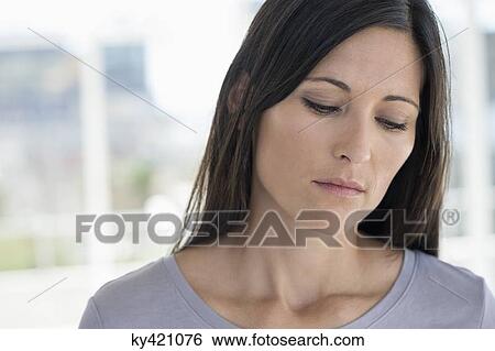 Close-up of an ill woman View Large Photo Image Stock Photograph - Close-up of an ill woman. Fotosearch