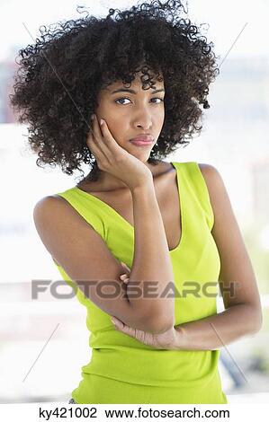 Portrait of a woman posing View Large Photo Image Stock Image - Portrait of a woman posing. Fotosearch