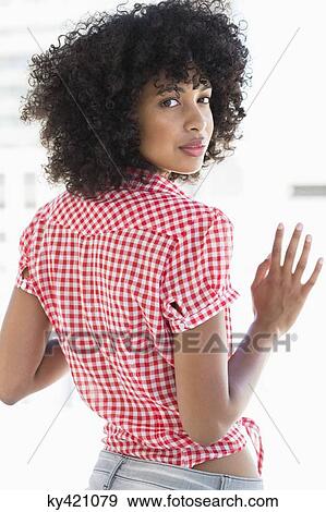 Stock Photo - Portrait of a woman posing. Fotosearch