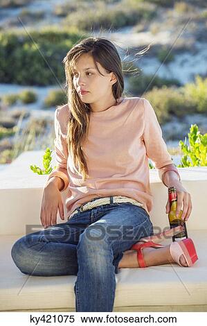 Woman enjoying beer outdoors View Large Photo Image Stock Photography - Woman enjoying beer outdoors. Fotosearch